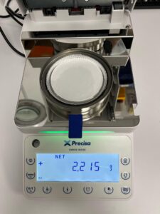 sample loaded using a sample pan and filter paper